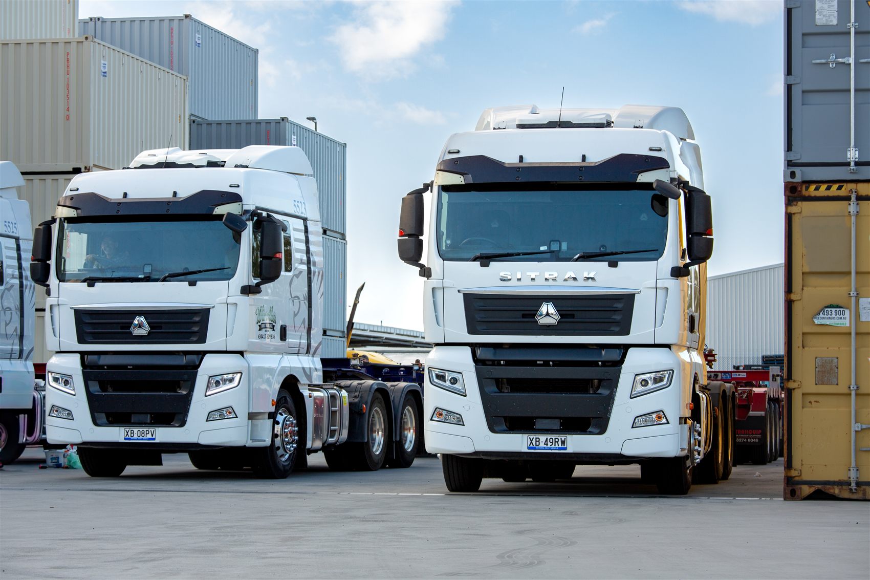 Two Windle's trucks in the yard at the Port of Brisbane