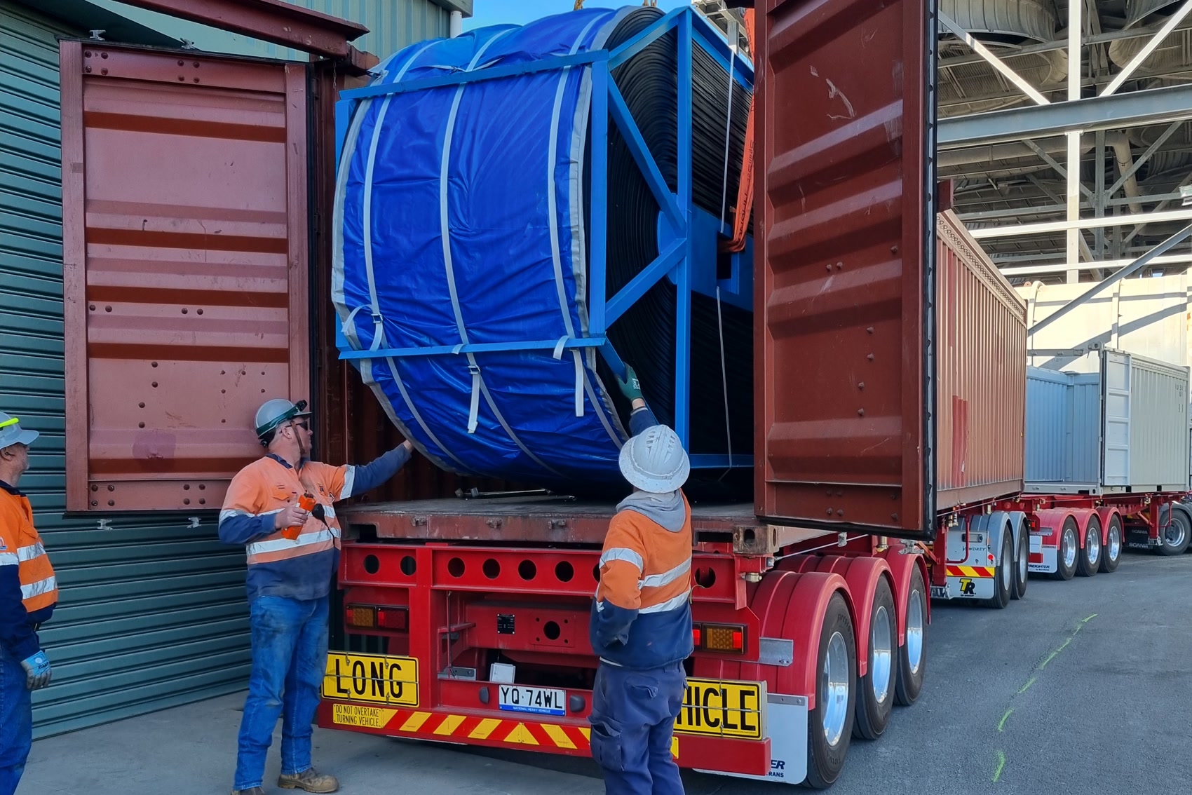The Windle's crew unpacking a container on site